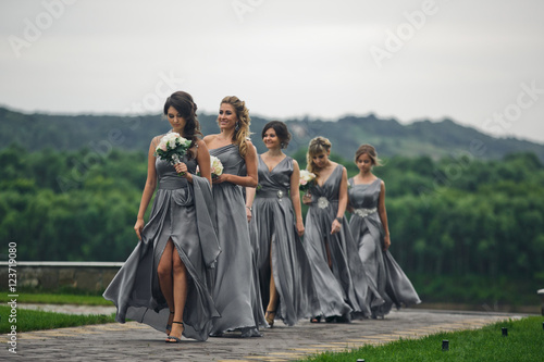 The bridesmaids go on the wedding ceremony