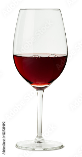 Glass of red wine cabernet suavignon merlot zinfandel malbec grenache syrah shiraz with rich dark red light coming through isolated on white background