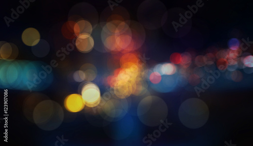 Colorful defocused bokeh lights in blur night background