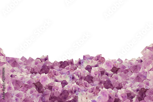 Pieces of natural amethyst over white as a background