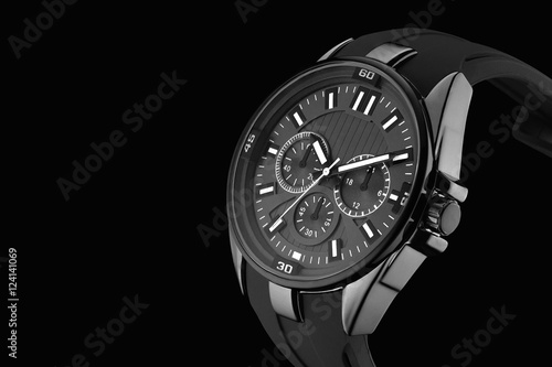 wrist mechanical watch on a black background closeup