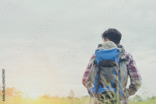 Man travel backpack relaxing outdoor on background Summer vaca