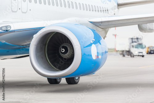 passenger plane moves along Runway