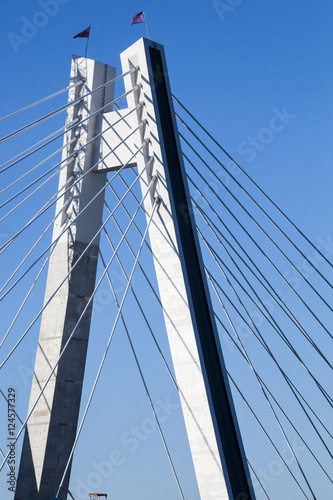 Construction of a new overhead bridge over the River with the flags of the European Union