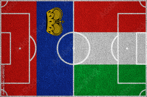 Flags Liechtenstein - Italy on the football field. 2018 football qualifiers