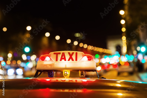 neon sign of a Parisian taxi