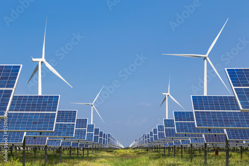  photovoltaics solar panel and wind turbines generating electricity in solar power station alternative energy from nature 