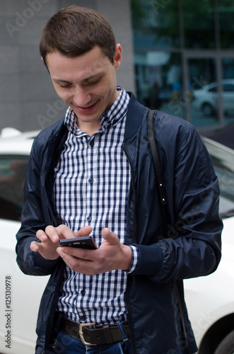 Young man using his phone