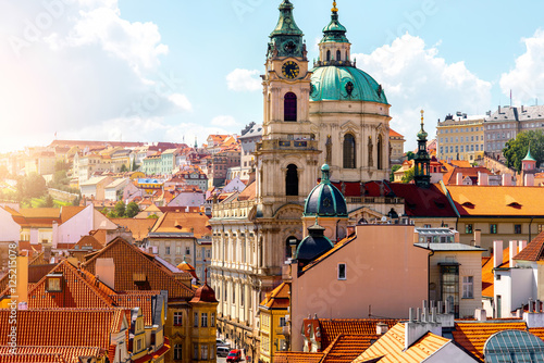 Cityscape view on the lesser town with saint Nicholas church in Prague city