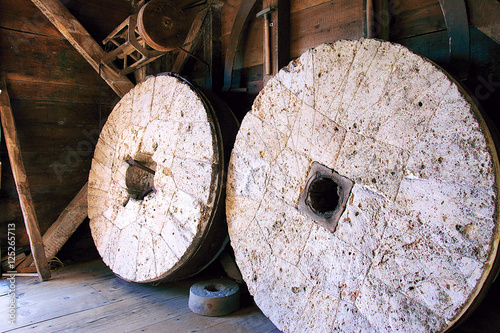 2 grinding wheels from a grist mill