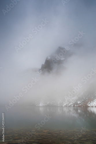 misty Black Lake in Tatra mountains, Poland