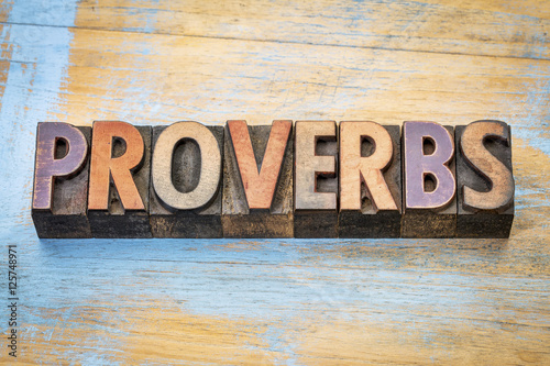 proverbs word abstract in wood type