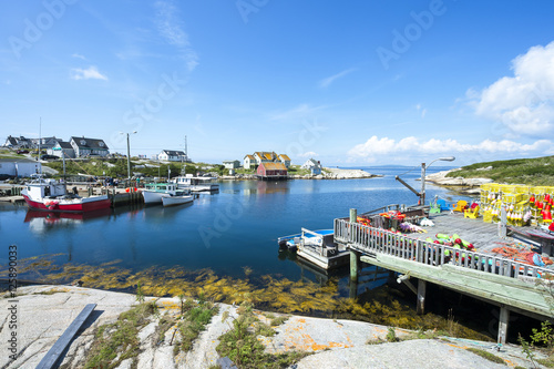 Scenic landscape view of the calm waters of the harbour in the fishing village of Peggy's Cove, in Halifax, Nova Scotia, Canada