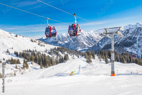  Skiers in cable car enjoying stunning view to Bavarian Alps, Fellhorn, Oberstdorf, Germany