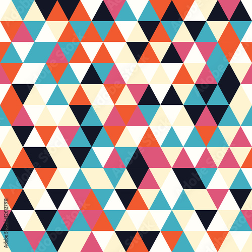 Geometric seamless pattern with colorful triangles in retro design