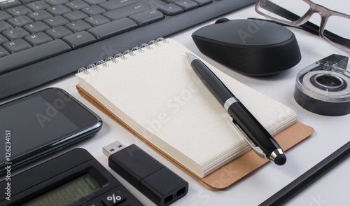 Flatlay of business office stuff isolated on white. Business office supplies or business office stationery object on white. Flatlay of stationeries or business office stuff.