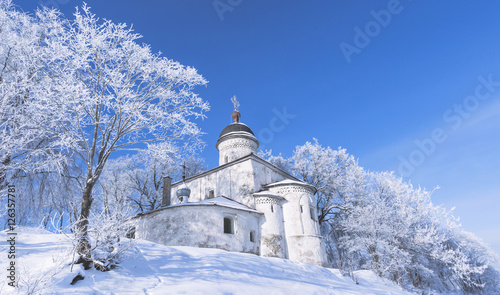 Orthodox church near by river. Pskov. Winter. Russia.