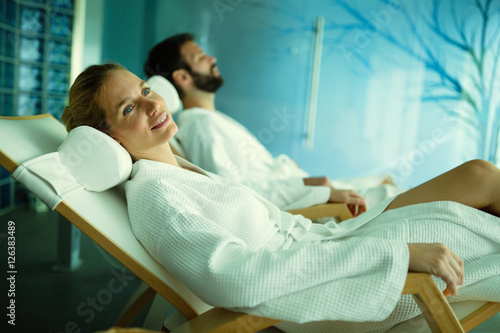 Couple relaxing in spa center