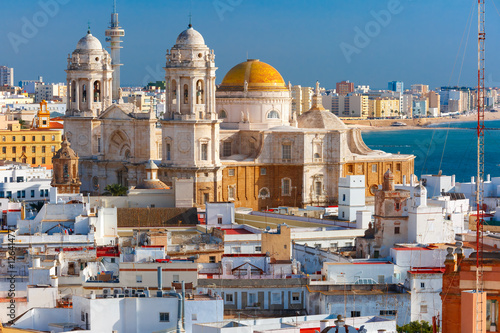 Aerial view of the old city rooftops and Cathedral de Santa Cruz in the morning from tower Tavira in Cadiz, Andalusia, Spain