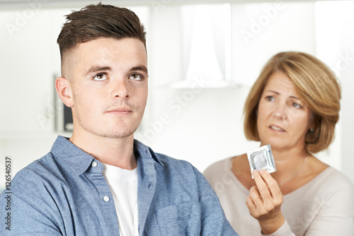 Mother Talking To Teenage Son About Contraception