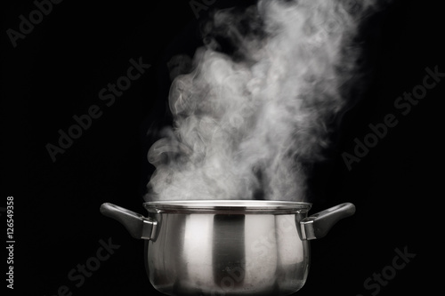 steam over cooking pot