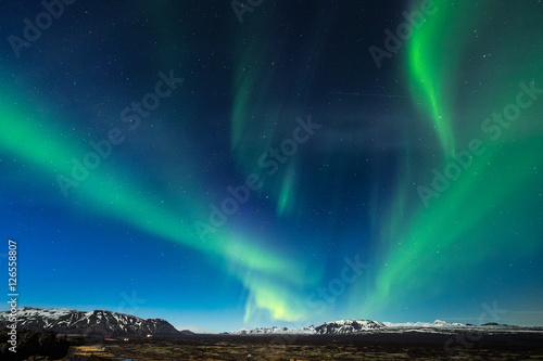 Aurora borealis over the Thingvellir National Park - Iceland