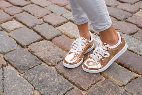 Woman with stylish shoes in the city