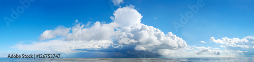 Sea panorama. Huge storm cloud over the sea