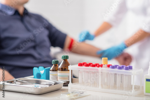 Man getting blood test preparation in clinic