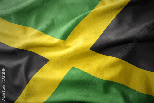 waving colorful flag of jamaica.
