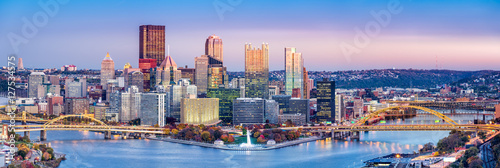 Pittsburgh, Pennsylvania skyline at dusk. Located at the confluence of the Allegheny, Monongahela and Ohio rivers, Pittsburgh is also known as "City of Bridges"