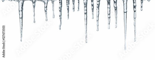 Close up of icicles isolated on white background