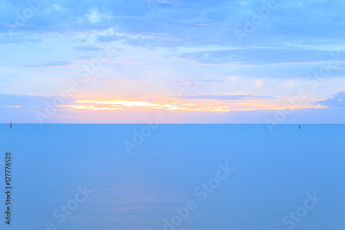 sunset at sea or ocean, with quiet feel or blue tone, sea landscape.