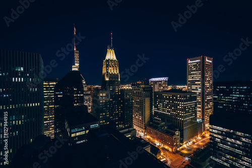 View of buildings in downtown at night, in Baltimore, Maryland.