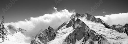Black and white mountain panorama in clouds