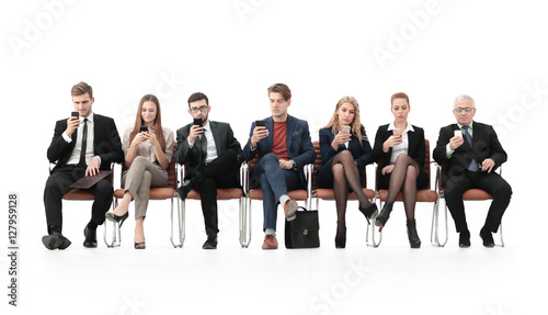 Employees carefully listening to their boss at a business meeti