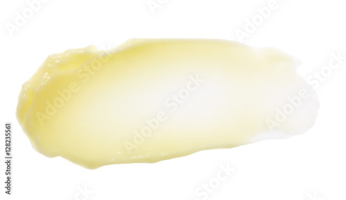 Yellow color skincare balm on background