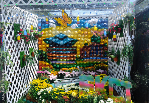 Small pocket garden made from mix of recycle material and flower at Floria Garden, Putrajaya, Malaysia. 