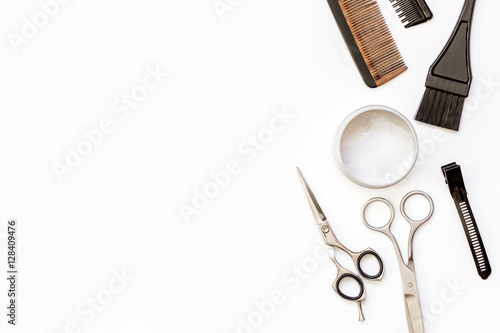 hairdresser tools on white background top view
