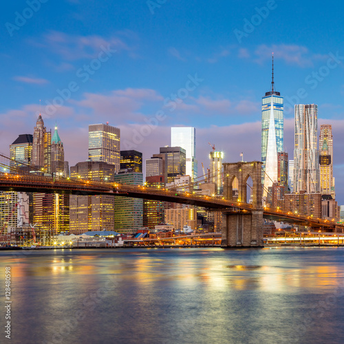 Sunrise view of Brooklyn Bridge and Manhattan skyline, New York