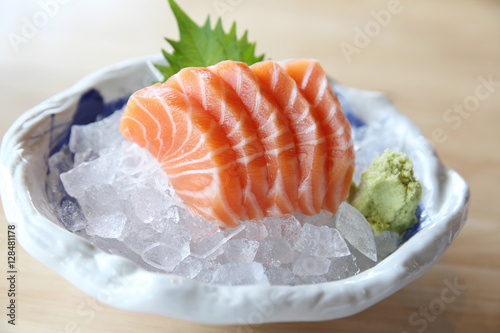 salmon sashimi on wood background , Japanese food