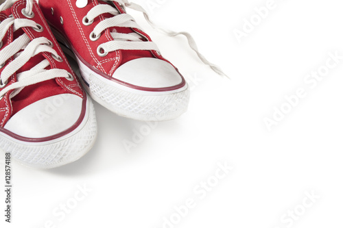 New red sneakers on white background