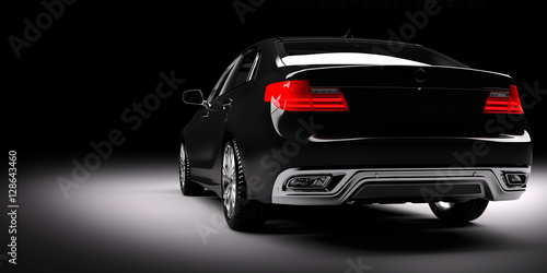New black metallic sedan car in spotlight. Modern desing, brandless.