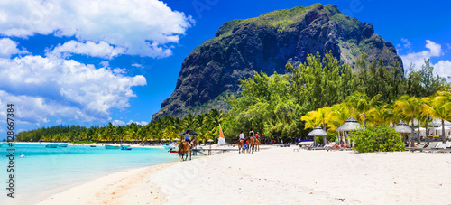 Stunning Le Morne in Mauritius. Horse riding on the beach