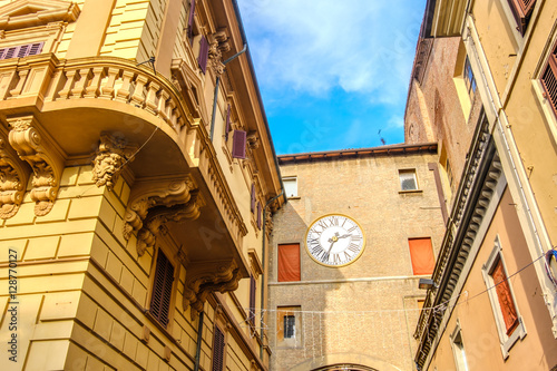 yellow balcony classic city clock building italy street architecture