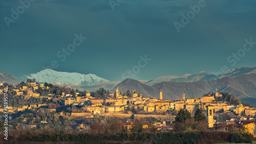 Bergamo Alta .with snow in the mountains