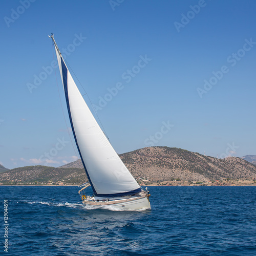 Boat competitor of sailing regatta. Yachting.