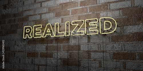REALIZED - Glowing Neon Sign on stonework wall - 3D rendered royalty free stock illustration. Can be used for online banner ads and direct mailers..