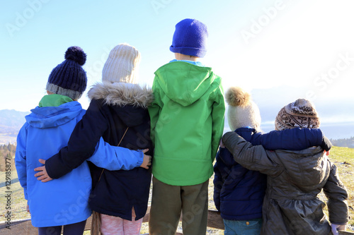 kids in winter waiting for snow