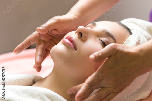 close-up portrait of young beautiful woman in spa environment. c